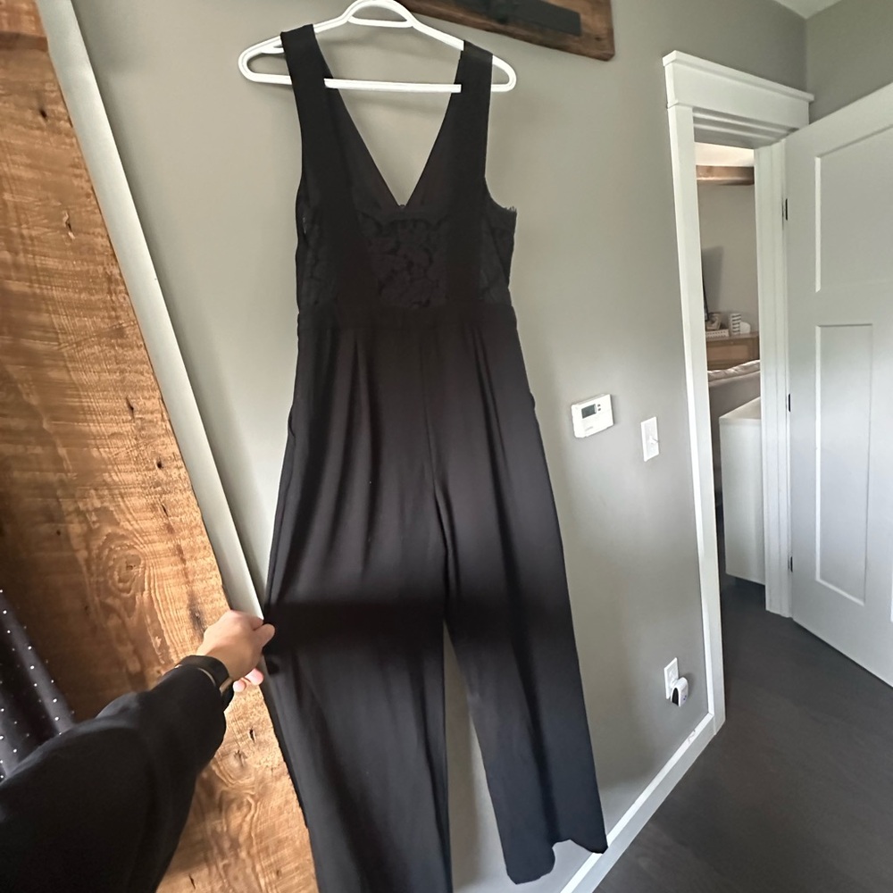 Lulu's Black Sleeveless Jumpsuit with Wide-Leg Design
